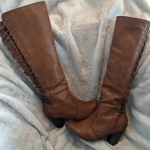 Torrid knee high faux leather boots.